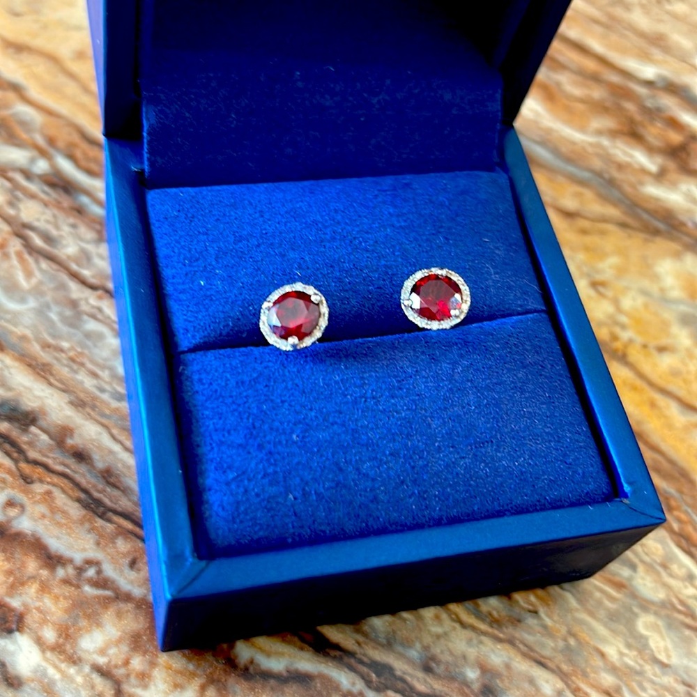Diamond halo Garnet stud earrings set in white gold